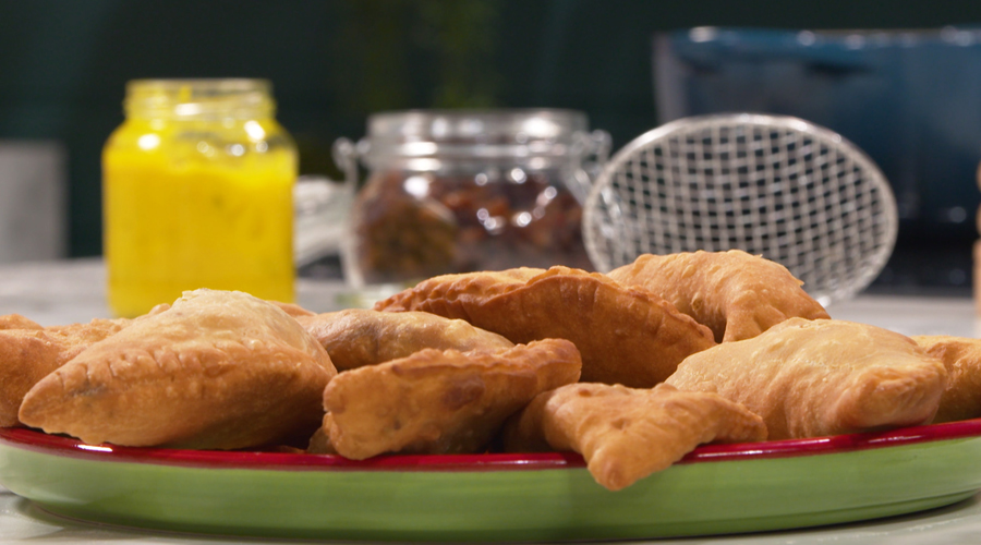 Exploring the Culinary Heritage: The Unique Flavor of Aruban Pastechi and Its Caribbean Identity