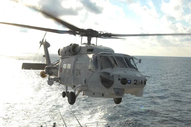 Japanese Navy Helicopters Collide in Tragic Accident: One Dead, Seven Missing