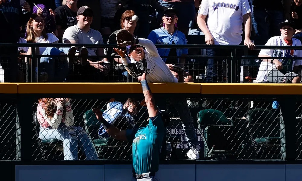 Fan Interference Controversy Mars Rockies’ Win Over Mariners