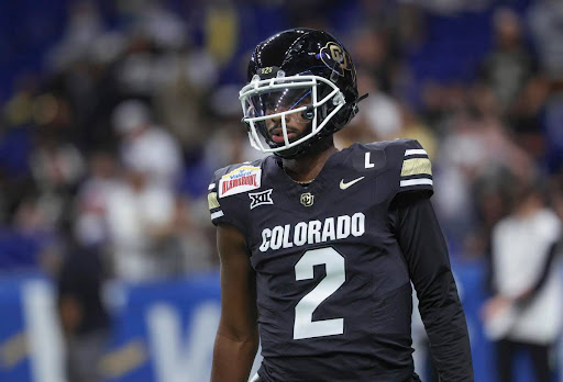 Sport Int: Shedeur Sanders Hints at No. 1 NFL Draft Pick with Giants-Themed Cleats